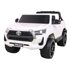 Toyota Hilux na akumulator dla dzieci Biały Pickup + Napęd 4x4 + Pilot + 2 bagażniki